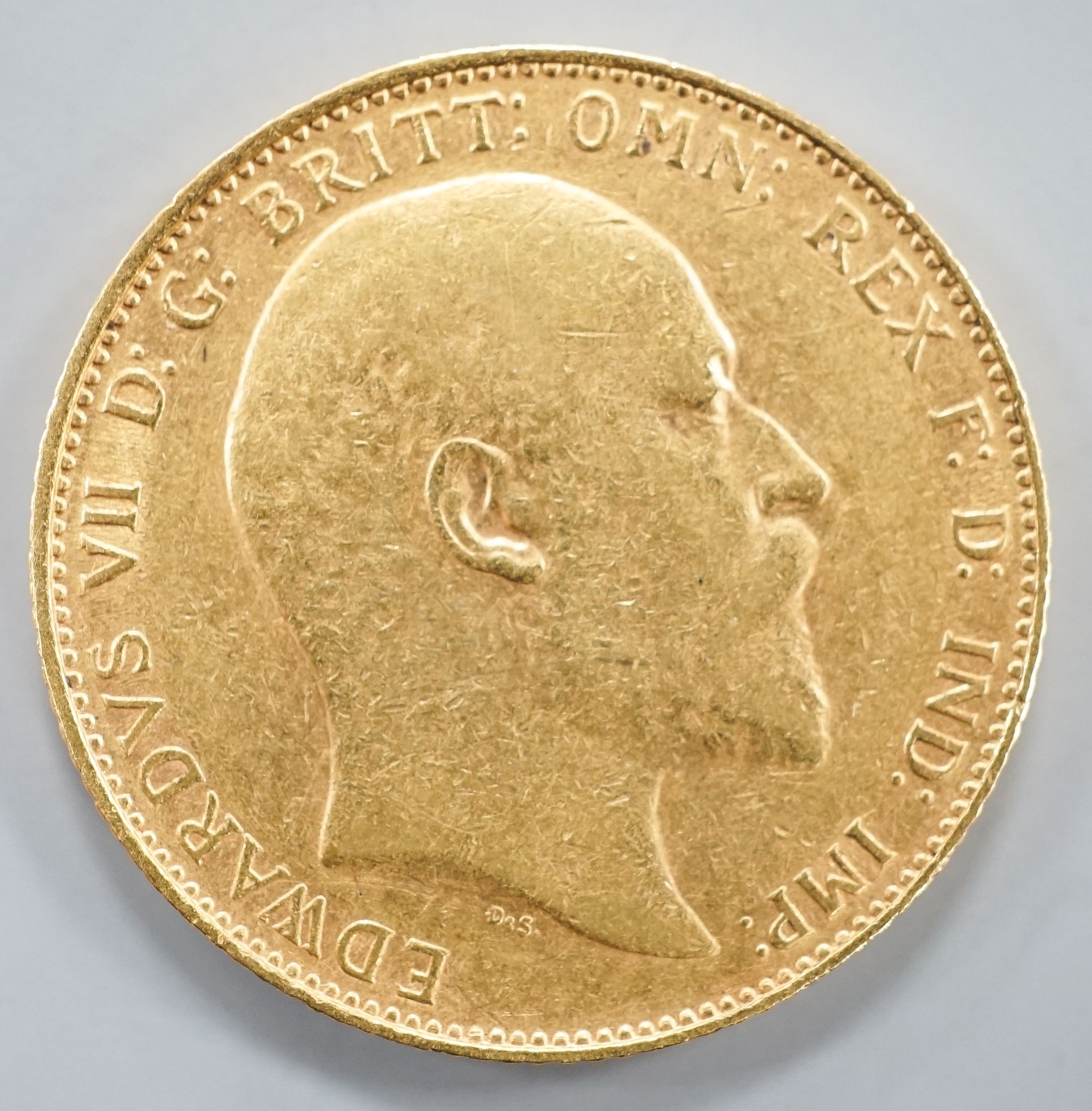 An Edward VII 1908 gold sovereign.